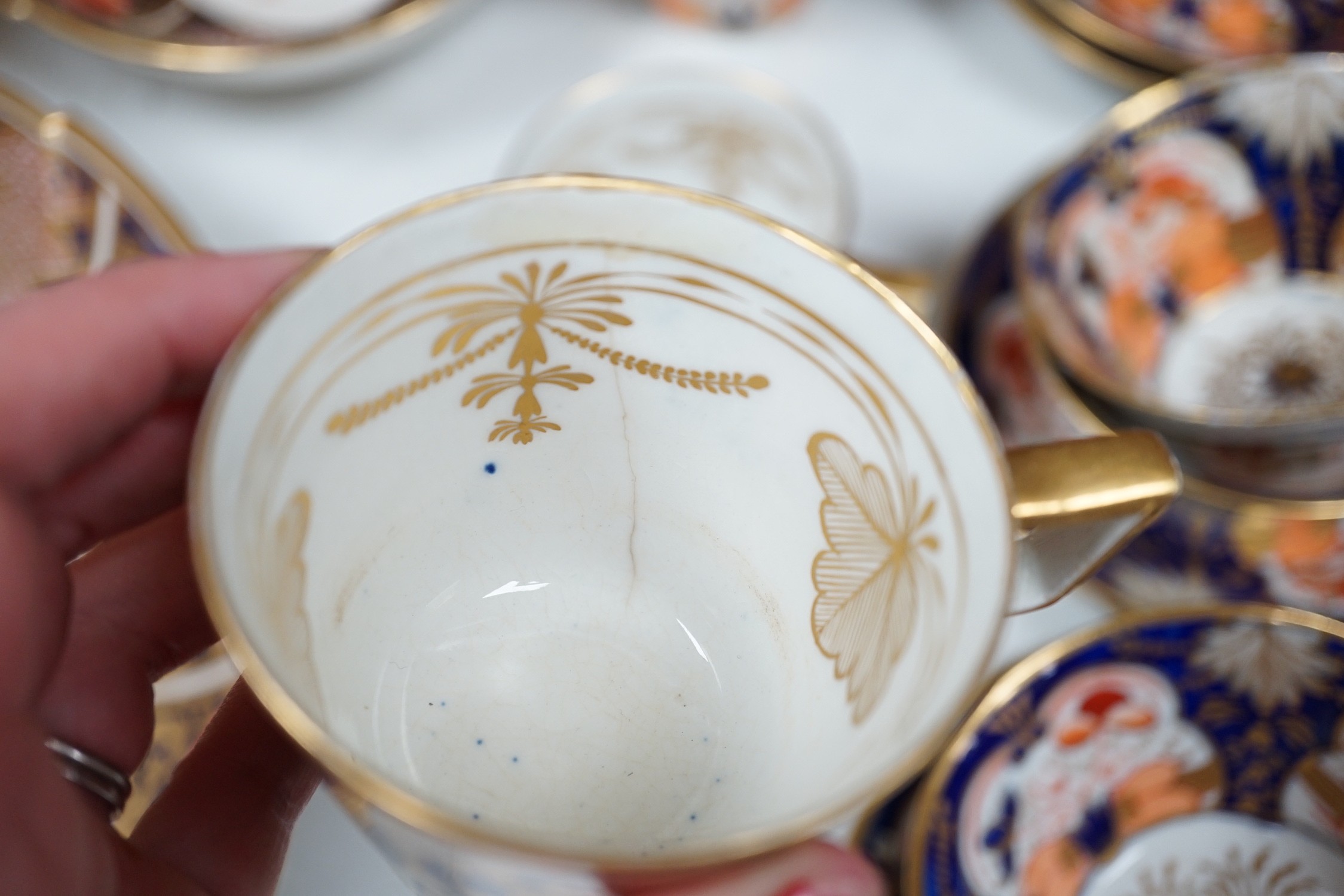An early 19th century English porcelain Japan-pattern tea and coffee set and two similar dessert dishes
